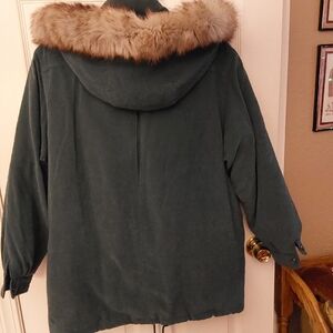 Blue Green Down winter jacket with fox fur-trimmed detachable hood.